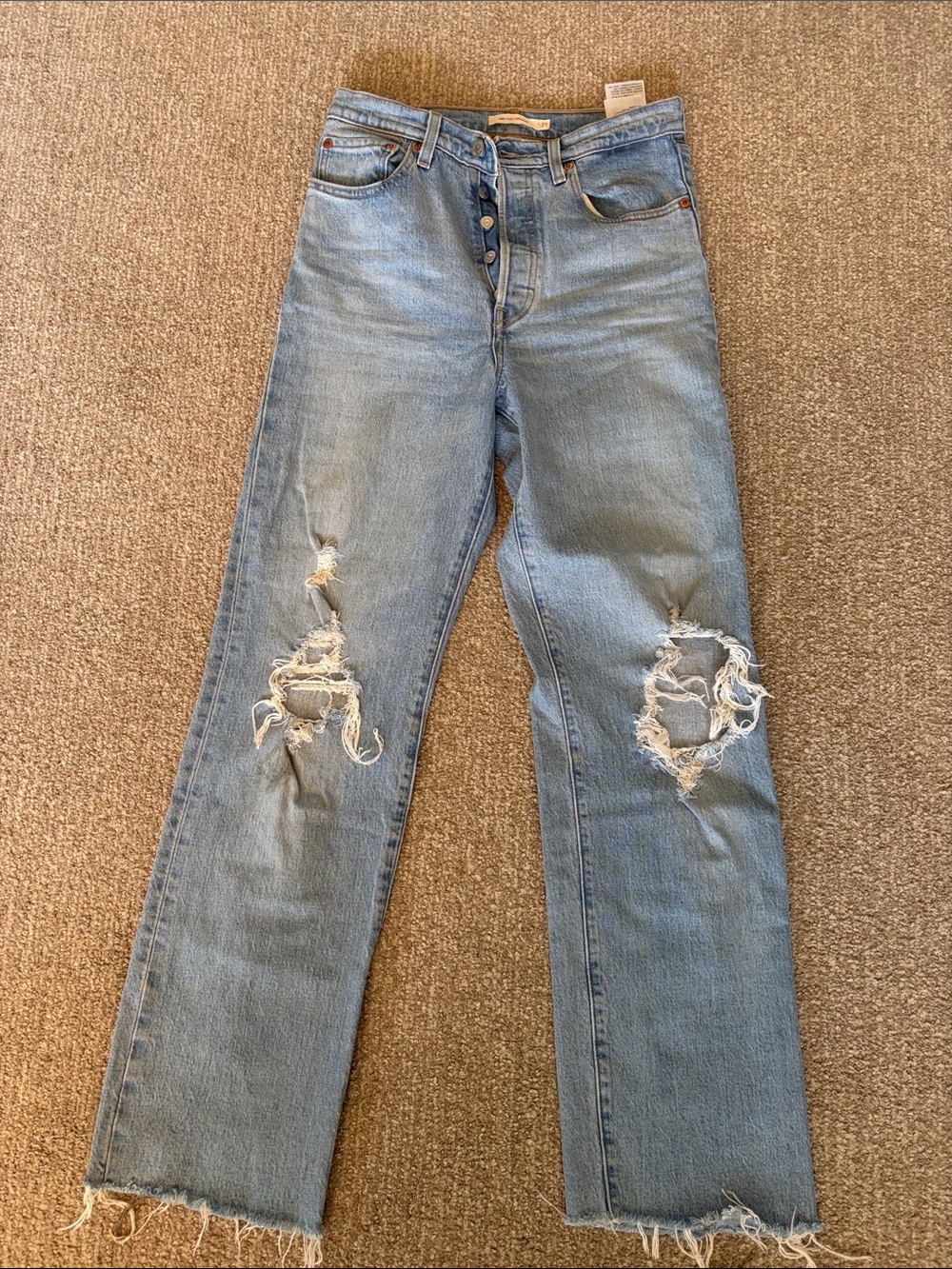 Levi's Light Blue Distressed Straight Leg Jeans with Raw Hem